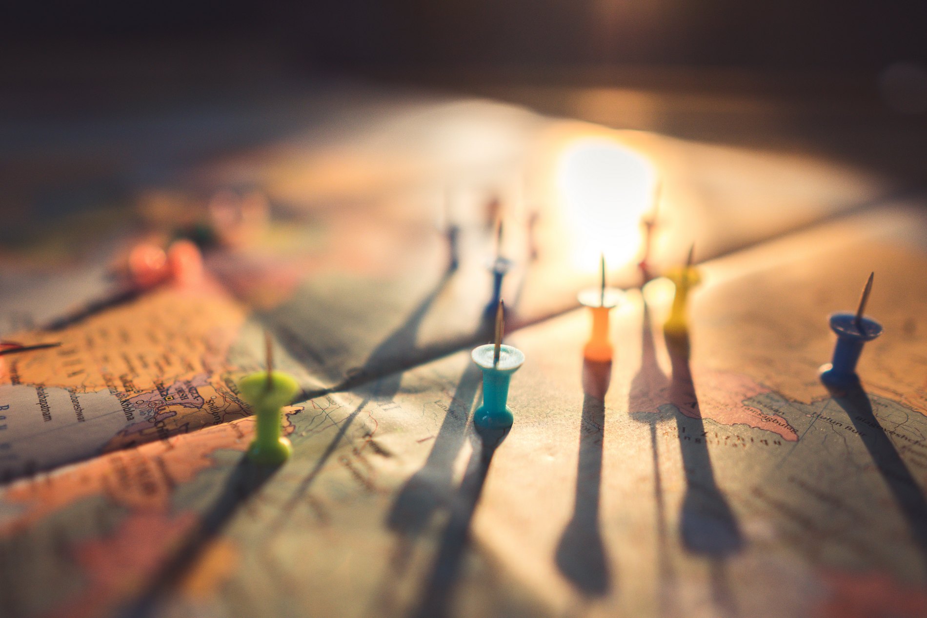 close-up-photo-of-assorted-color-of-push-pins-on-map-10788501.jpg